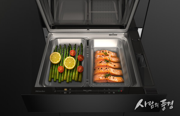 The new Miele steam drawer, when combined with a 45 cm compact oven with microwave in a 60 cm niche, forms a space-saving 3-in-1 solution for baking, reheating and steam cooking, with two separate steam cooking containers for preparing different food at the same time. Coming March 2027. (Photo: Miele)